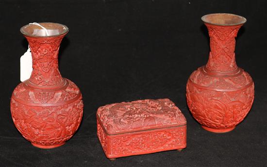 A pair of Chinese cinnabar lacquer vases and a similar box